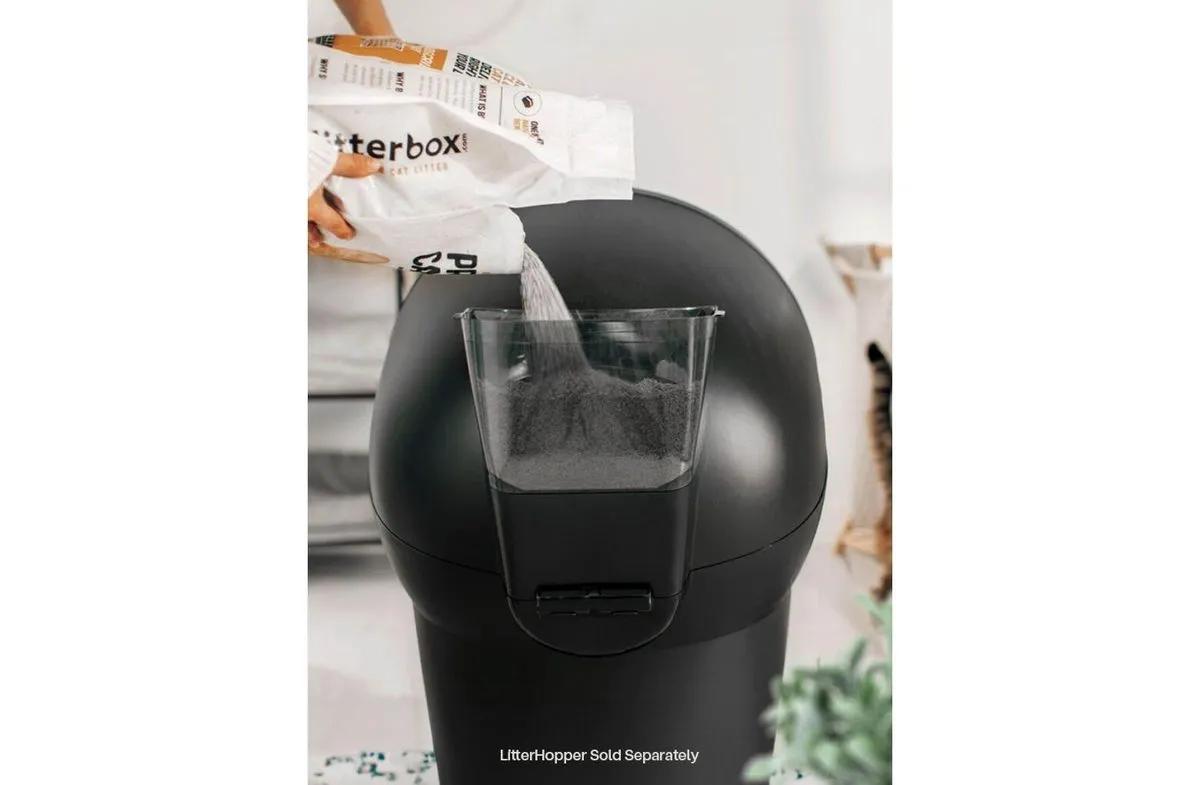 Litter-Robot 4 with the LitterHopper accessory being refilled, official Whisker product photo of the $129 add-on that tops up litter automatically