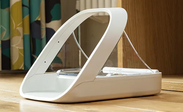 Close-up of the SureFeed Microchip Pet Feeder from the Sure Petcare official product gallery, showing the bowl and lid that decide how much head room a large cat gets at mealtime