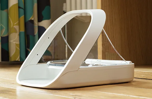 Close-up of the SureFeed Microchip Pet Feeder from the Sure Petcare official product gallery, showing the bowl and lid that decide how much head room a large cat gets at mealtime